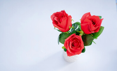 Red Rose Flower. Red plastic roses on isolate white background. clipping path.valentine celebration concept