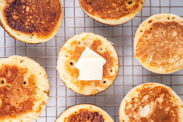 Traditional English skillet fried breakfast pastry Crumpets, popular in England, Britain pancakes....