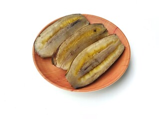 Steamed bananas on plate isolated on white background 