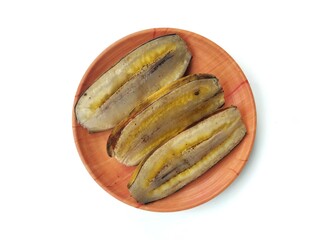 Steamed bananas on plate isolated on white background 