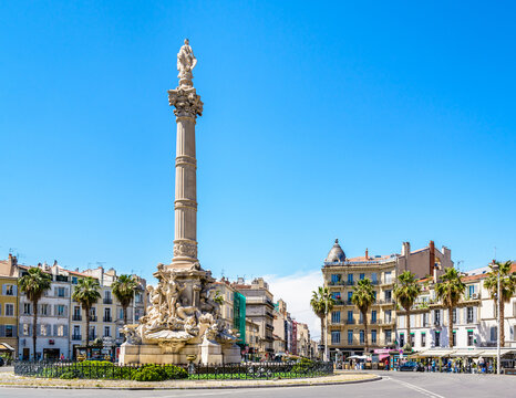 Marseille, France - May 23, 2018: The Cantini fountain by french sculptor Jules Cantini, representing the city on top of a marble column, was built in the center of the place Castellane in 1911.