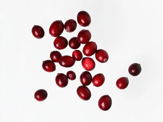 scattered cranberries on a white background