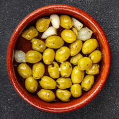 Mediterranean olives with garlic snack aperitif fresh tasty food dish delicious gourmet food...