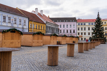 Trebic, Czech Republic - January 4, 2025: Cityscape of the city. Indoor Christmas market. Wooden houses.