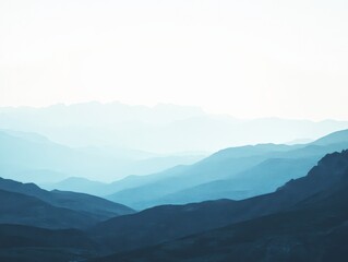 Obraz premium mountain ranges receding into the distance with a hazy atmosphere