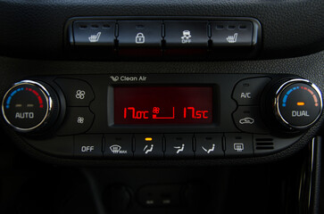 Car climate control panel display showing temperature settings