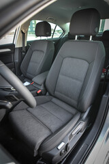 Comfortable car interior with gray fabric seats