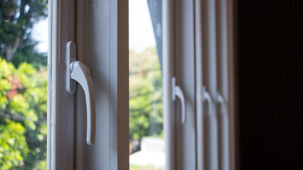white window handles in city apartments