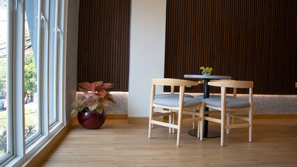 elegant wooden furniture of antique table and chairs in cafe