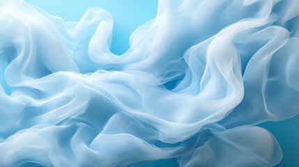Obraz premium Flowing light blue fabric, studio shot, abstract background, textile texture.