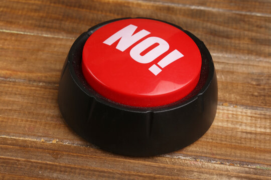round button with the words no