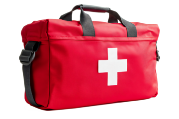 A bright red bag with a white cross emblem, containing a first aid kit, lies on a clean isolated on white background.PNG