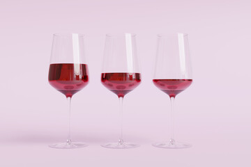 Wineglasses having largest to smallest amount of red wine from right to left. Illustration of the concept of quitting alcohol