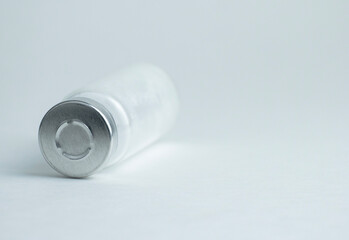 Simple glass vial with a metal cap