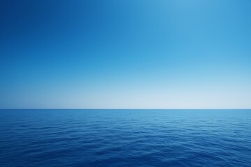 Obraz premium arafed view of a blue ocean with a clear sky