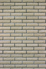 Seamless texture of beige horizontal crushed brick masonry