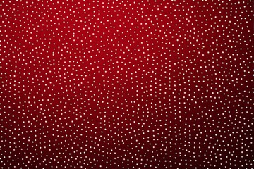 Fototapeta premium a close up of a red background with small white dots