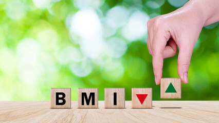 BMI big mac index symbol, Concept words BMI big mac index on wooden cube, Medicine and Body Mass Index concept, Doctor health.