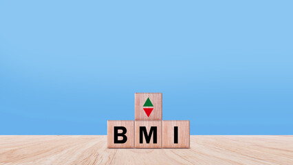 BMI big mac index symbol, Concept words BMI big mac index on wooden cube, Medicine and Body Mass Index concept, Doctor health.