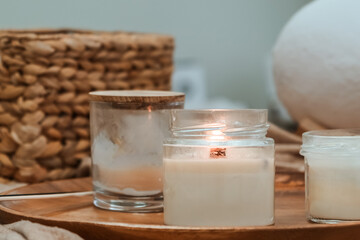 wide shot of  cozy massage room filled soft candlelight aromatherapy lamps, creating tranquil soothing atmosphere.serene, natural ambiance offers a perfect space for relaxation and wellness treatments