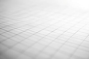 Abstract close-up of white graph paper with soft focus, showcasing clean grid lines and a minimalistic design