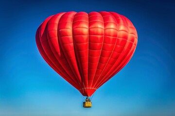 Fototapeta premium Red Heart Balloon Floating on a Blue Sky - Romantic Stock Photo