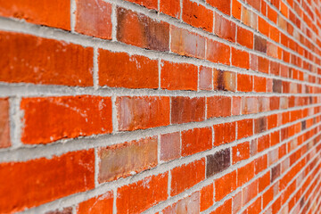 Backsteinwand aus Ziegel aus schräger Perspektive
