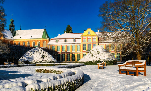 Lawns and architecture in winter Oliwa Park in Gdansk, ancient abby garden