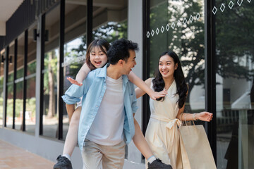 Joyful Family Shopping Experience with Parents and Children Enjoying a Day Out in the City
