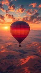 Obraz premium Serene Hot Air Balloon Drifting Through Vibrant Desert Sunset Landscape
