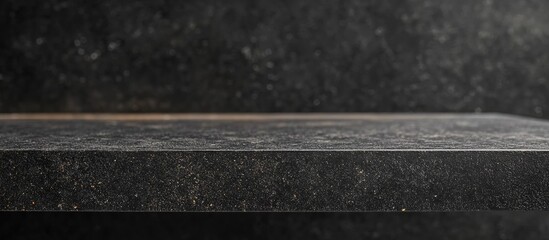 Fototapeta premium Black Concrete Surface for Product Presentation with Empty Copyspace Ideal for Mockups and Advertising Display
