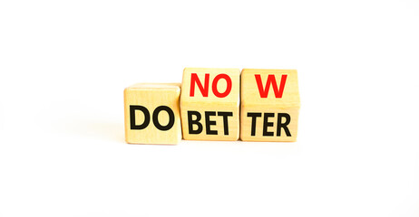 Do better and now symbol. Concept words Do better Do now on wooden block. Beautiful white table white background. Business do better and now concept. Copy space.