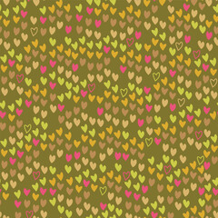 A seamless vector, blending pattern of pink brown, green, yellow hearts irregular scattered on a light pink background. Great for digital Valentines projects backgrounds, textures, fabrics, or gift