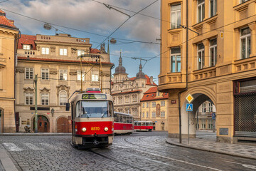 Fototapeta premium Prague, Czech Republic: Typical Prague Red Tram in Karmelitská Mala Strana