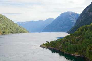 Majestic fjord landscape in serene afternoon light