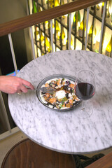  Elegant Meal with Red Wine in a Sophisticated Setting