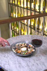  Elegant Meal with Red Wine in a Sophisticated Setting