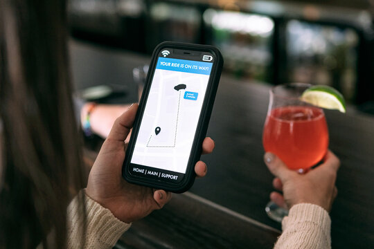 Brewery: Woman Uses Smart Phone To Order Ride Share