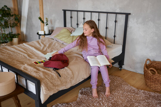 A girl preparing for school in a cozy home setting