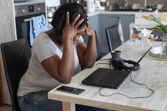 bad day, tired woman with laptop computer at home