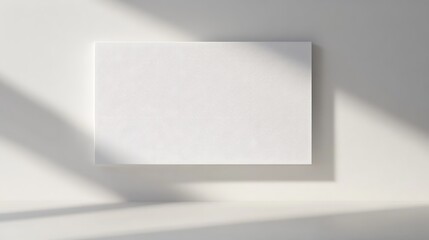 Fototapeta premium Plain white canvas banner mockup on a clean white background with soft lighting