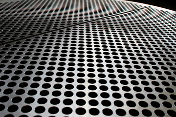  Perforated Metal Surface Close-Up