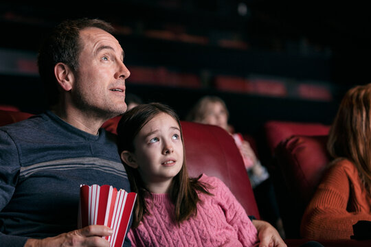 Movies: Father With Girl During Scary Movie