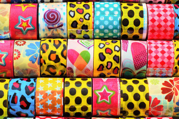 Background. Packing tape coils with a variety of patterns