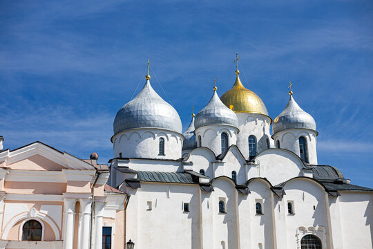 White Church With Domes And Orthodox Crosses