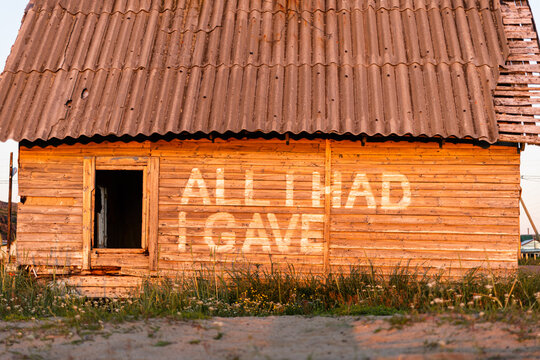 Abandoned House With Semantic Inscription