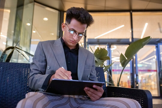 Businessman  in a jacket solves work issues