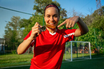 Female soccer player on a sports field