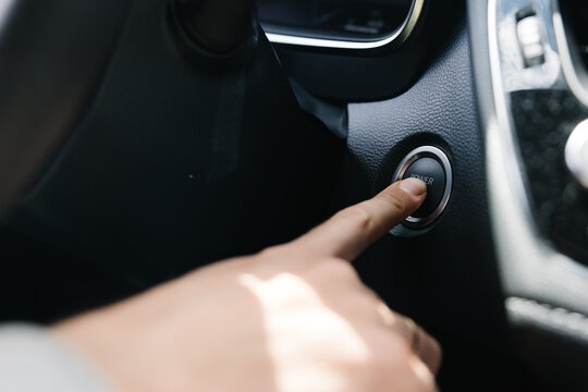 A man  starting the car