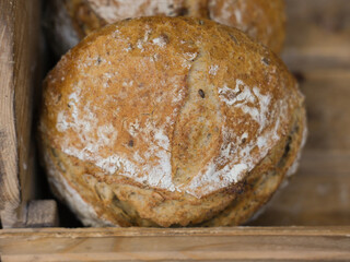 round bread in flour, close-up